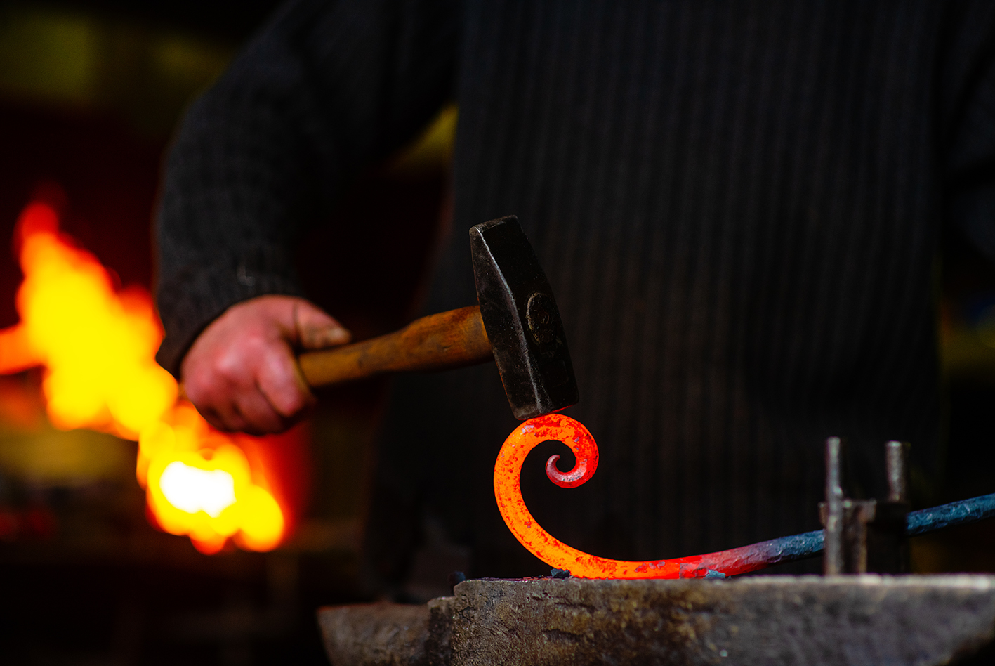 RTZEN blacksmith hammering hot hand-forged wrought iron
