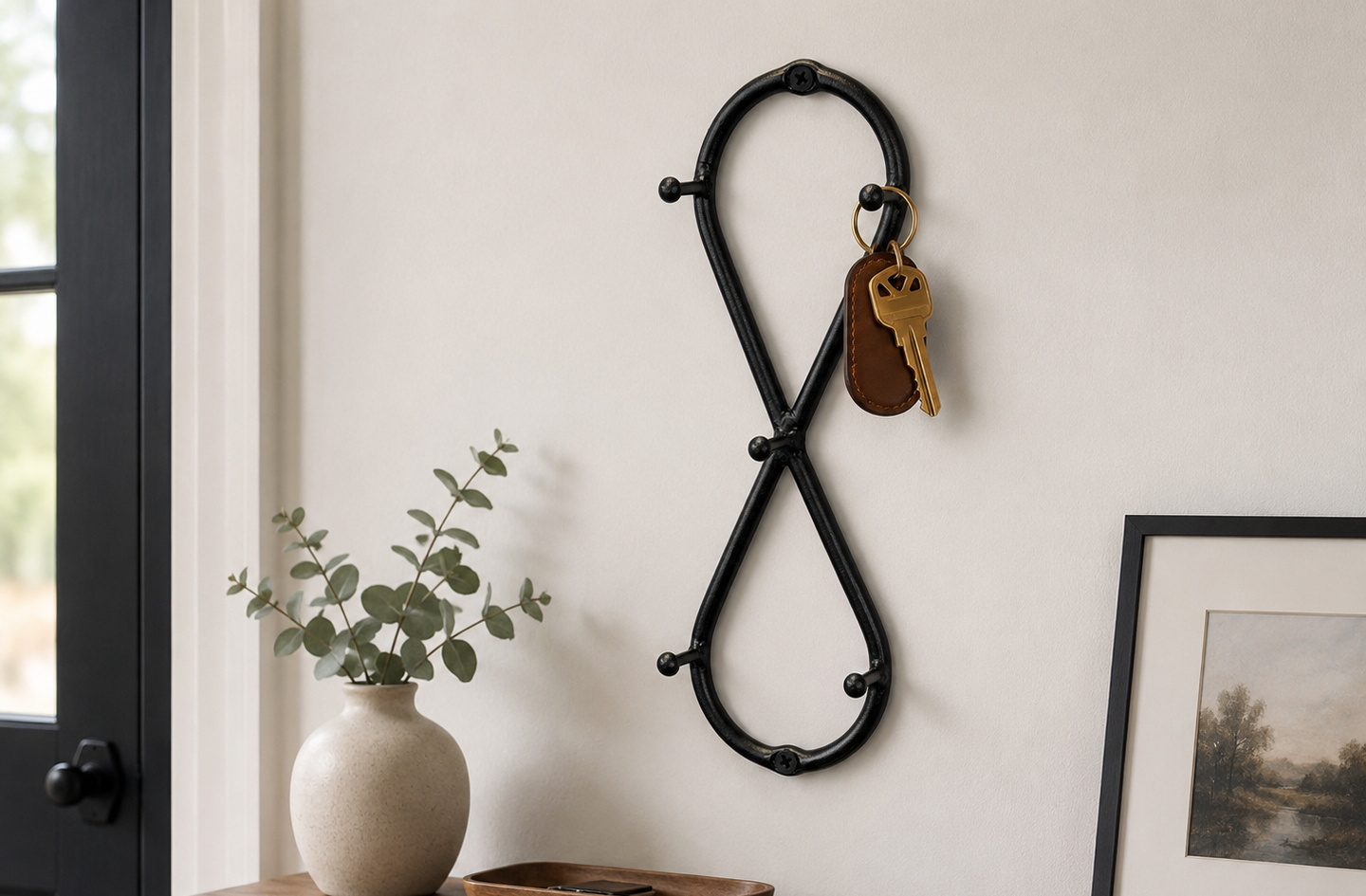 RTZEN wrought iron vertical infinity style key hanger mounted as a wall key holder